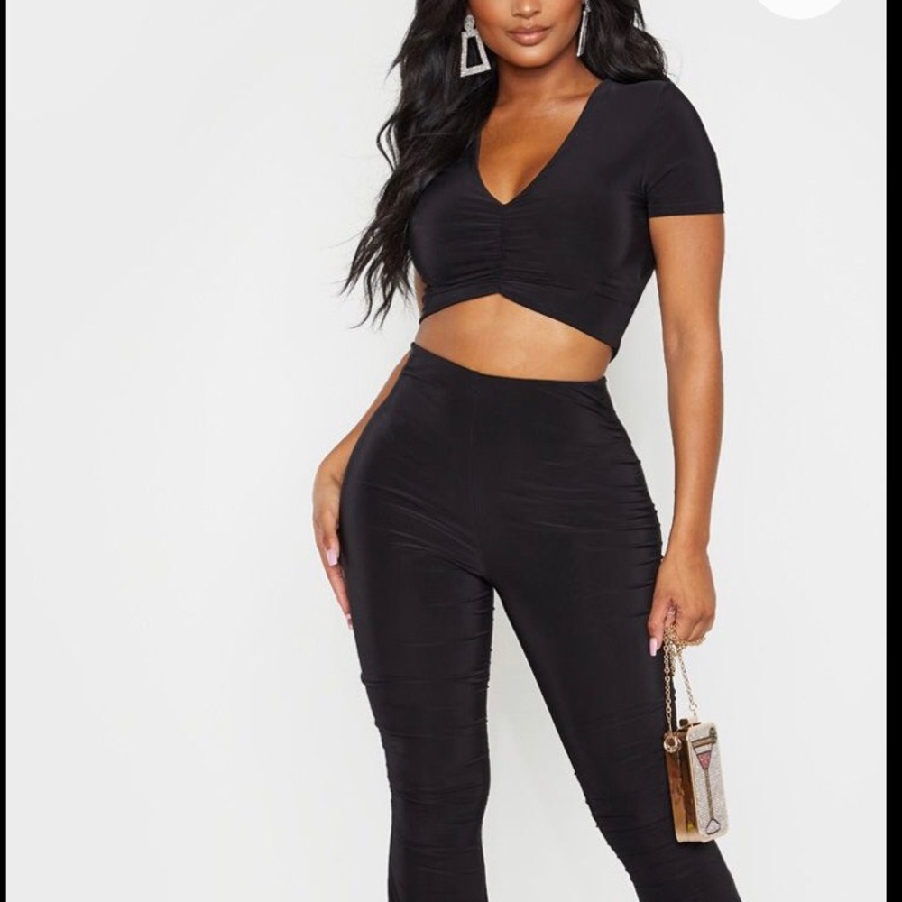 Pretty little thing black slinky trousers size 4
